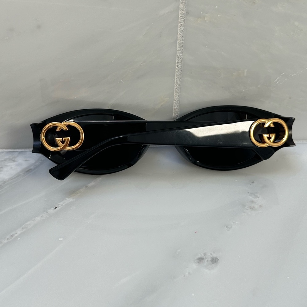 Gucci “Hailey” Oval Sunglasses